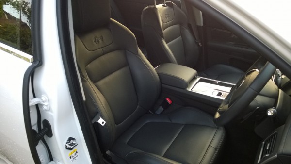 Sports front seats feature electric or pneumatic adjustment in every direction - even side bolster support. Driving position is very good but optional sunroof reduces headroom.