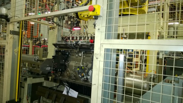 Darlington is a highly automated facility. This ISB engine is going through its computer operated head torqueing procedure under a watchful "electronic eye"