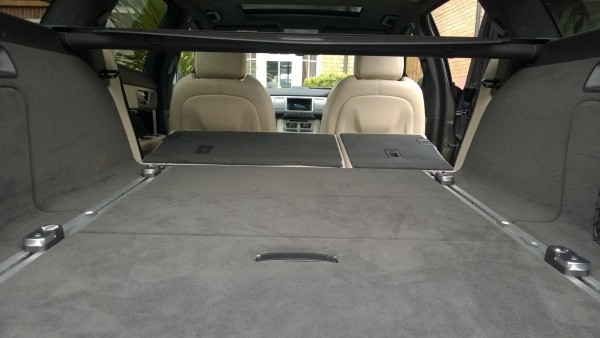 Drop the rear seats and remove the rolling parcel cover and there is almost 1700 litres of space on an almost totally flat floor.