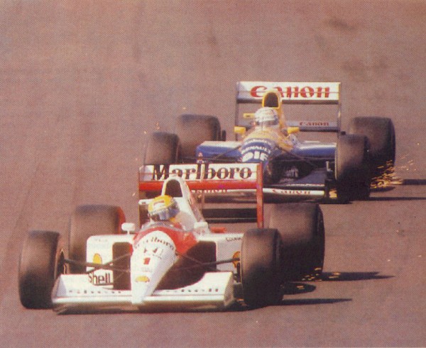 With Senna, sparks flew on and off the race track. This image portrays the glory days of F1 as Senna and Mansell dogfight for supremacy.
