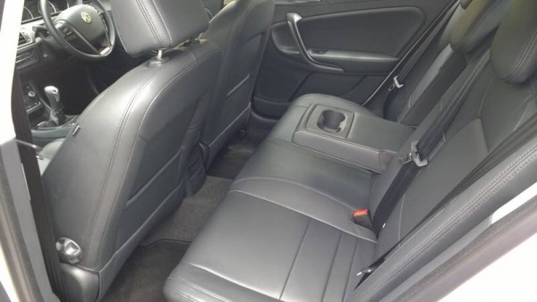 Its okay in the back with decent head and legroom - comfy too. Rear passengers gain a brace of cup holders and their own face level air vents.