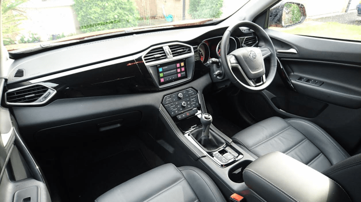 Comfy and supportive front seats with excellent driving position. Too much hard plastic but it seems much better crafted than previous MG models. Buttons and switches feel robust and good to the touch and the cabin is very refined. Faux piano black looks stylish but is prone to reflections in bright light. Infotainment and Sat-Nav system works very well but no Wi-Fi link.